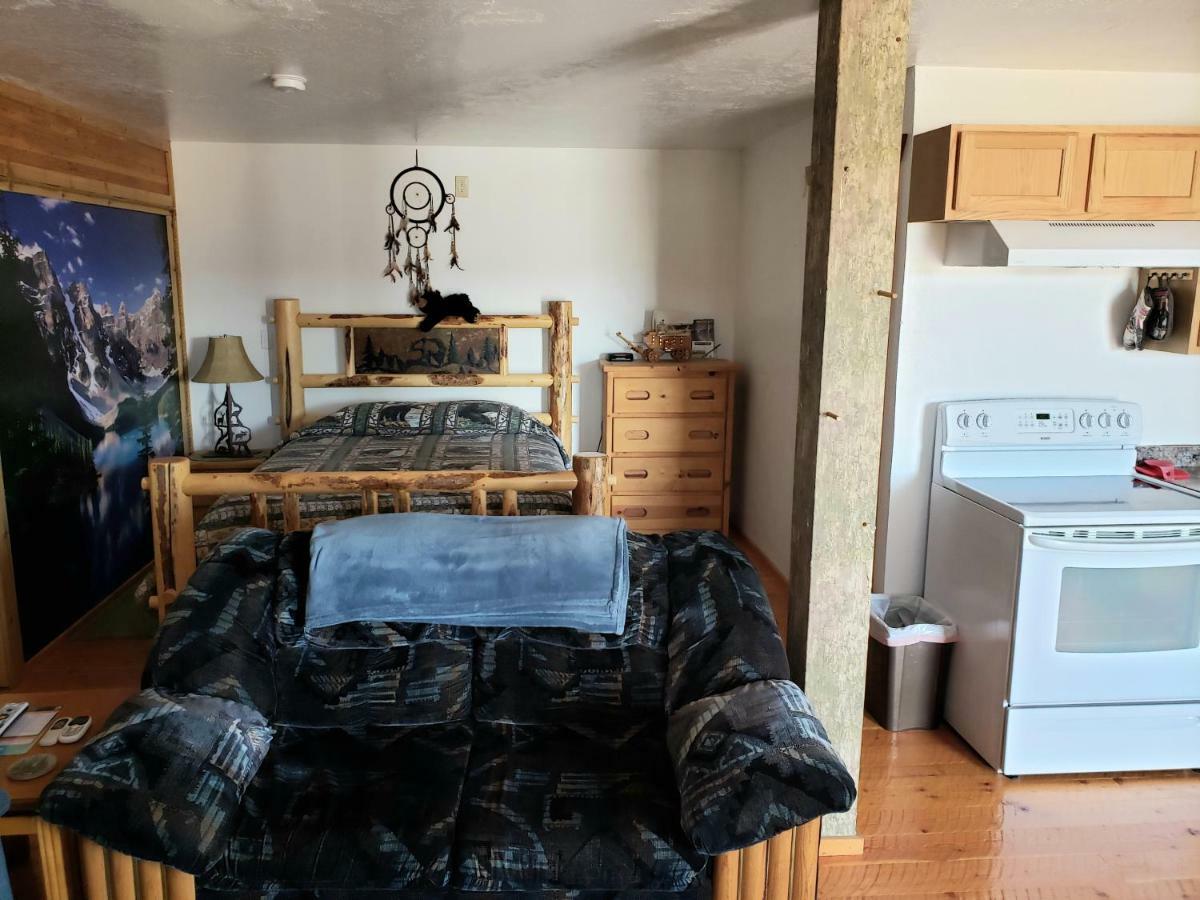 Wolf Den Log Cabin Motel And Rv Park Thayne Экстерьер фото